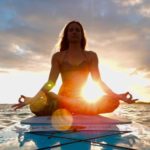 yoga floats oahu hawaii sunrise